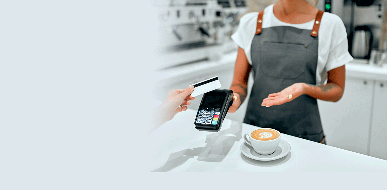 debit card purchase at a coffee shop using a contactless terminal